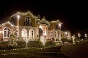 Residential home decorated for Christmas with cheerful lights near Brainerd, MN.
