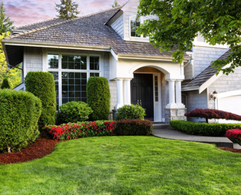 A house with beautiful landscaping.